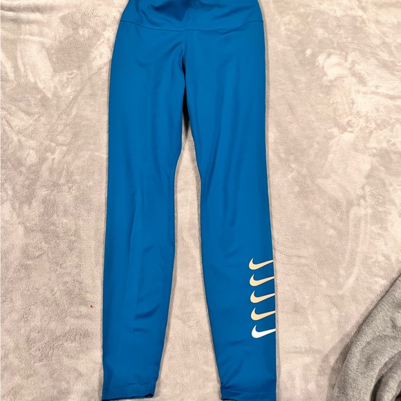 Nike Pants - Nike Swoosh Run Mid-Rise 7/8 Running Leggings - Blue